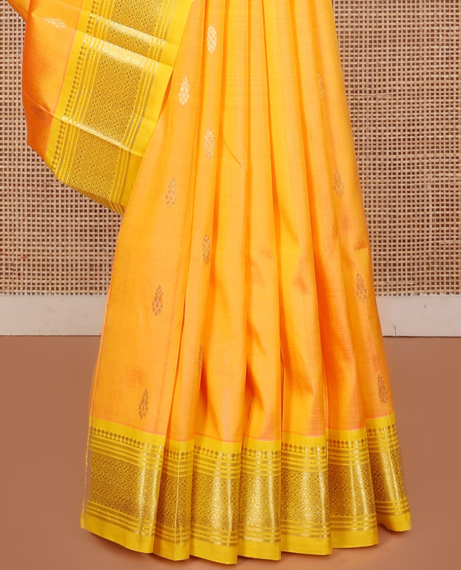Yellow Kanchipuram Silk Saree, Subtly Sparkled with Zari Buttas, a Contrast One-Sided Border of Panner Sombu, Banaras, Muthu, and Jaal, Zari-Woven Pallu, and No Blouse