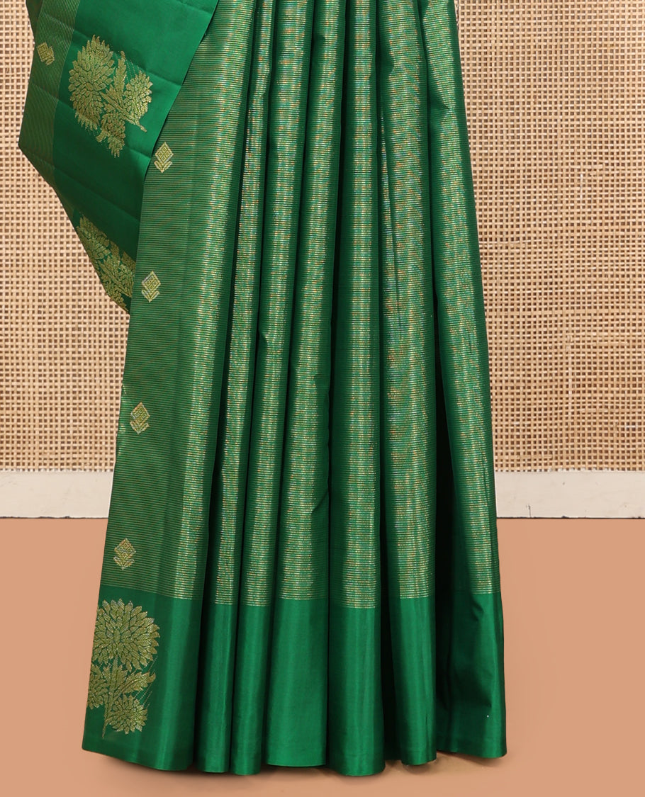 Green Kanchipuram Silk Saree, Woven with Zari Buttas and Stripes, Highlighted by a Zari Border of Floral Designs, Grand Jaal Pallu, and a Matching Blouse