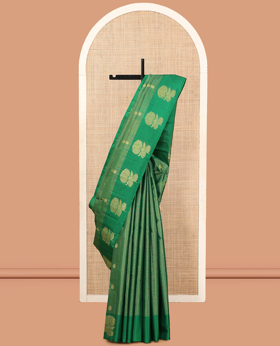 Green Kanchipuram Silk Saree, Woven with Zari Buttas and Stripes, Highlighted by a Zari Border of Floral Designs, Grand Jaal Pallu, and a Matching Blouse