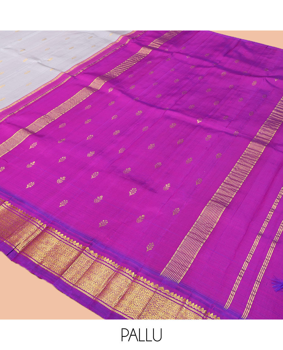 Grey Kanchipuram Silk Saree, Adorned with Zari Buttas on Its Body, Complemented by a Contrast One-Sided Korvai Border of Thilakam Mokku, Banaras, and Jaal Designs, Pallu Depicts Zari Designs, and Comes Without a Blouse