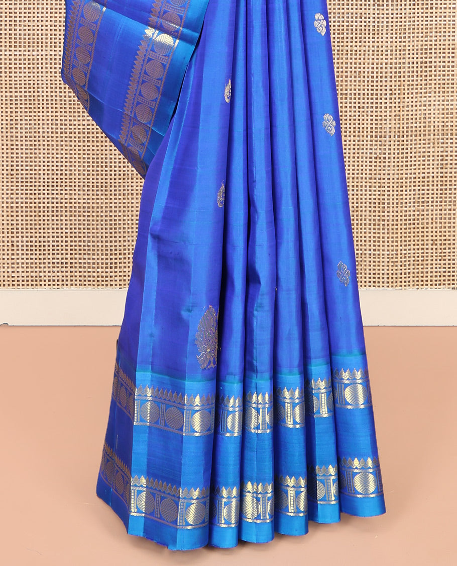 Blue Kanchipuram Silk Saree Features Zari Buttas, a One-Sided Rettai Pettu Border of Thilakam Mokku, and Rudraksham Designs, Zari Design Pallu, and No Blouse