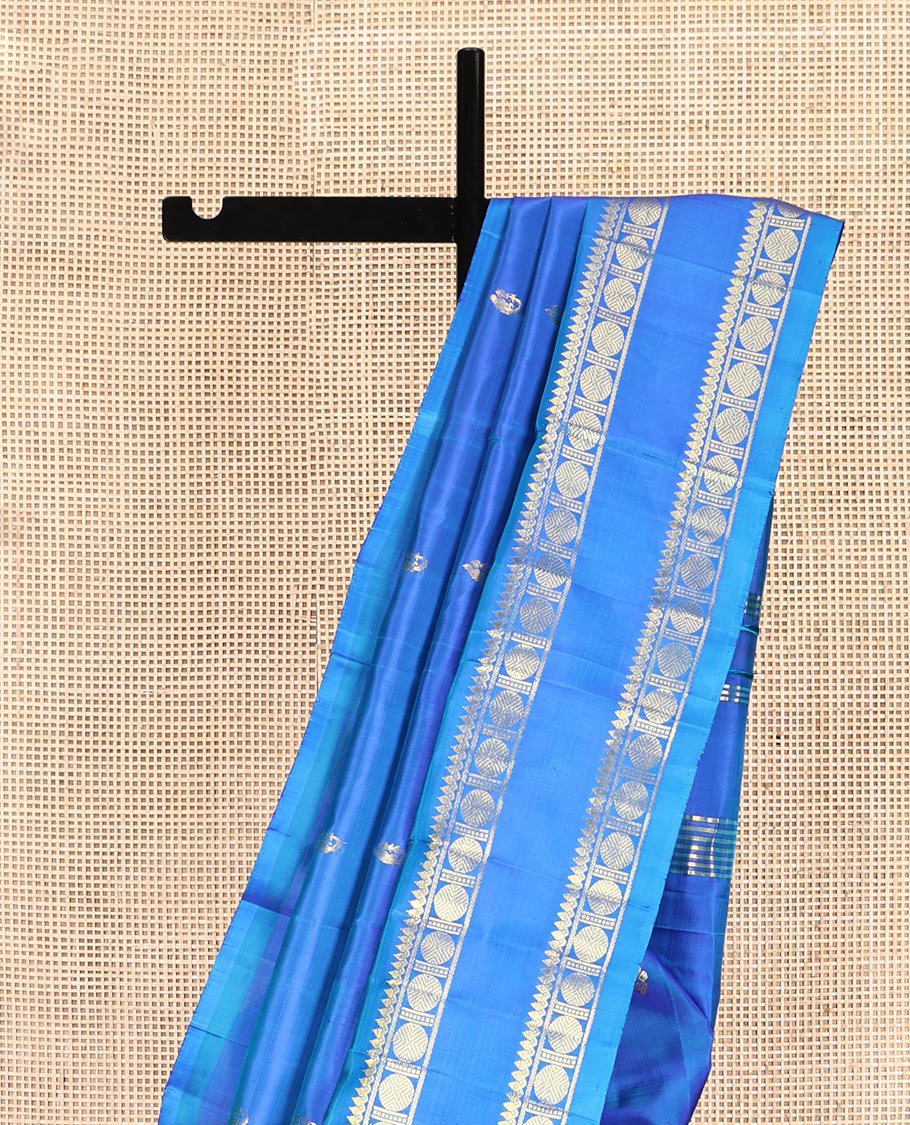 Blue Kanchipuram Silk Saree Features Zari Buttas, a One-Sided Rettai Pettu Border of Thilakam Mokku, and Rudraksham Designs, Zari Design Pallu, and No Blouse