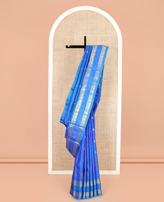 Blue Kanchipuram Silk Saree Features Zari Buttas, a One-Sided Rettai Pettu Border of Thilakam Mokku, and Rudraksham Designs, Zari Design Pallu, and No Blouse