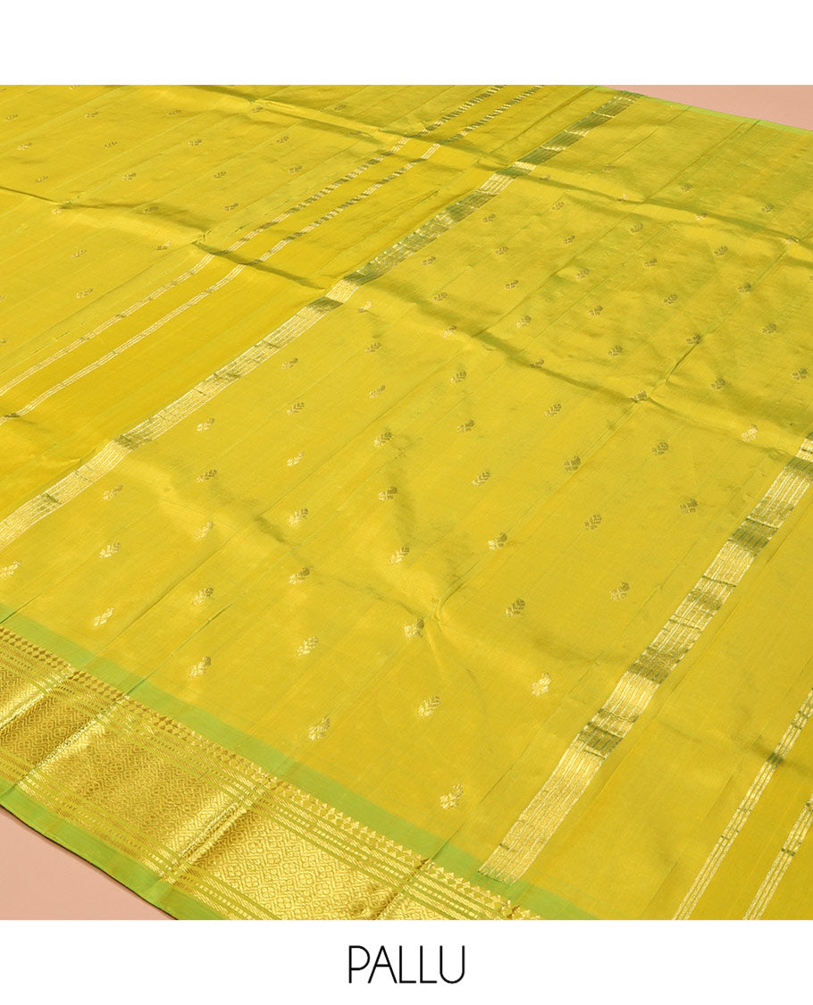 Green Kanchipuram Silk Saree Featuring Zari Buttas, Complemented by a Contrast One-Sided Border of Panner Sombu, Banaras, Muthu, and Jaal Design, Zari Design Pallu, and No Blouse