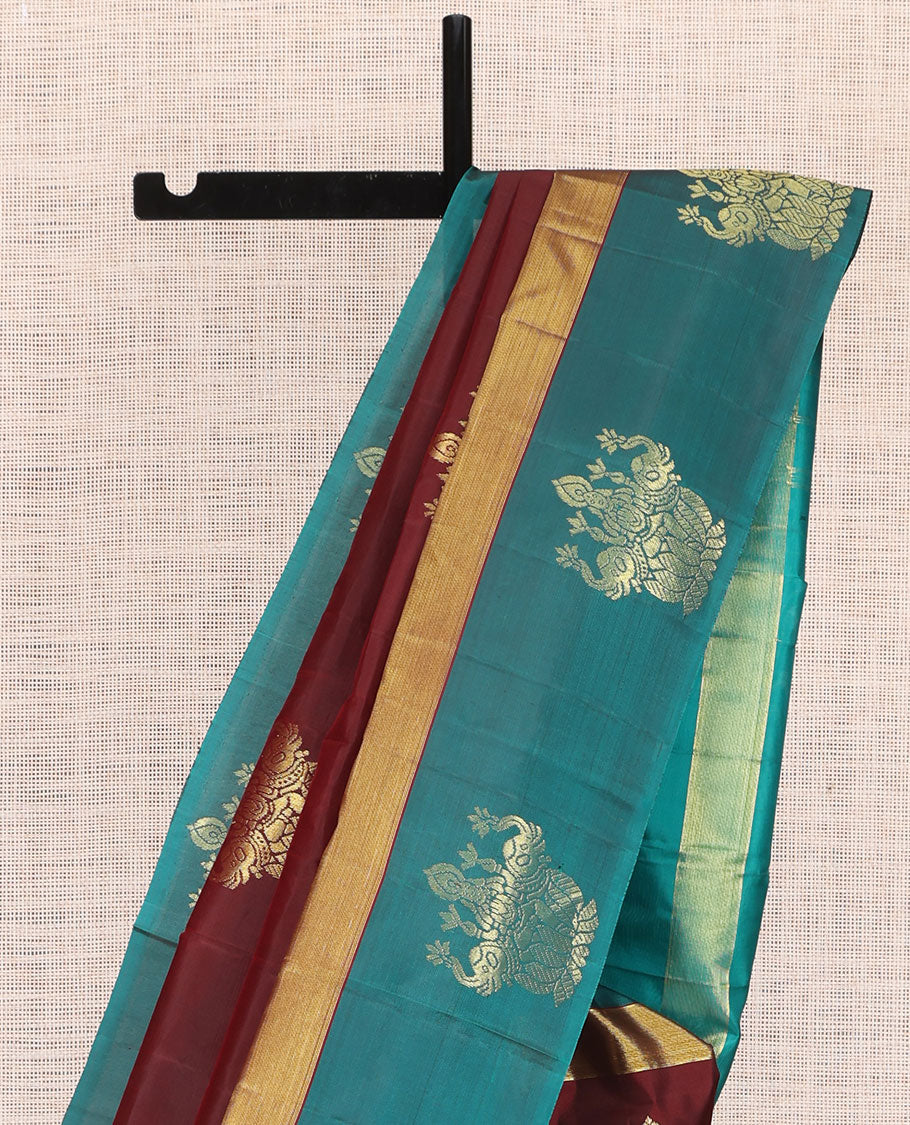Maroon Kanchipuram Silk Saree, Woven with Goddess Lakshmi Buttas, a Contrast Goddess Lakshmi Border, Goddess Lakshmi Pallu, and a Contrast Blouse