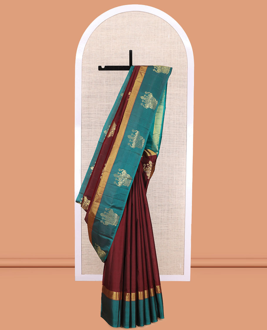 Maroon Kanchipuram Silk Saree, Woven with Goddess Lakshmi Buttas, a Contrast Goddess Lakshmi Border, Goddess Lakshmi Pallu, and a Contrast Blouse