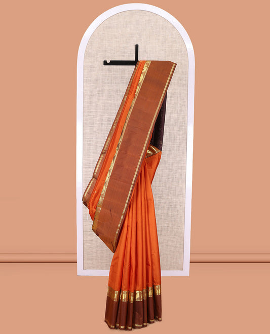Orange Kanchipuram Silk Saree, Woven with Buttas, Complemented by a Contrast Rettai Pettu Meen Motif Border,  Pallu of Zari Design, and Contrast Blouse