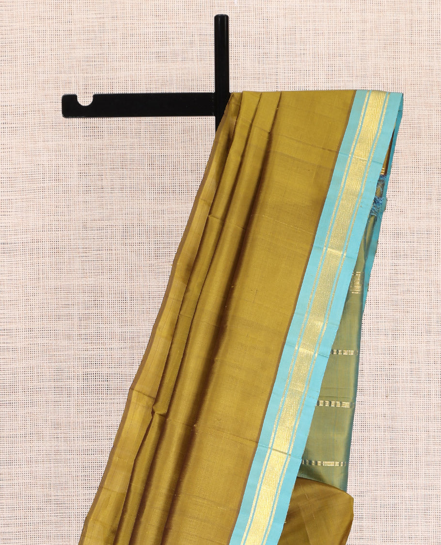 Green Plain Kanchipuram Silk Saree, a Contrast Zari One-sided Border, Zari Striped Pallu, and No Blouse