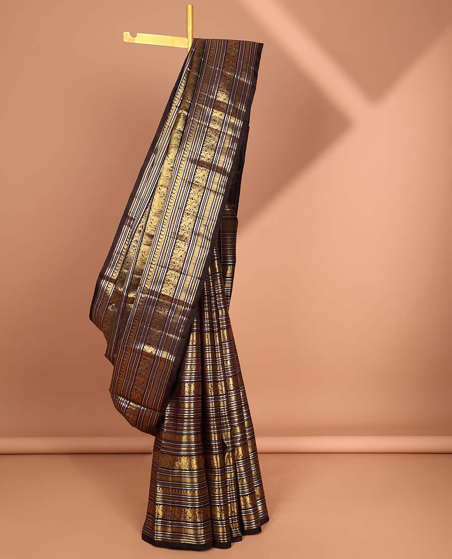 Brown intricate traditional zari design silk saree with self-border & floral buttas, intricate zari design pallu