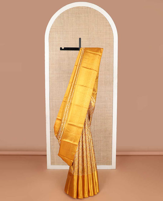 Orange floral jacquard kancheepuram tissue silk saree  with contrast border of thilakam mokku, kathir, mayil kann design & ogee design pallu