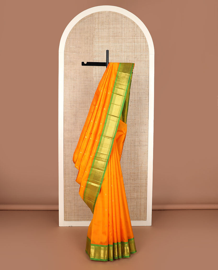 Orange zari buttas Kanchipuram silk saree, contrast border of panner sombu, banaras, muthu & mayil kann & zari design pallu