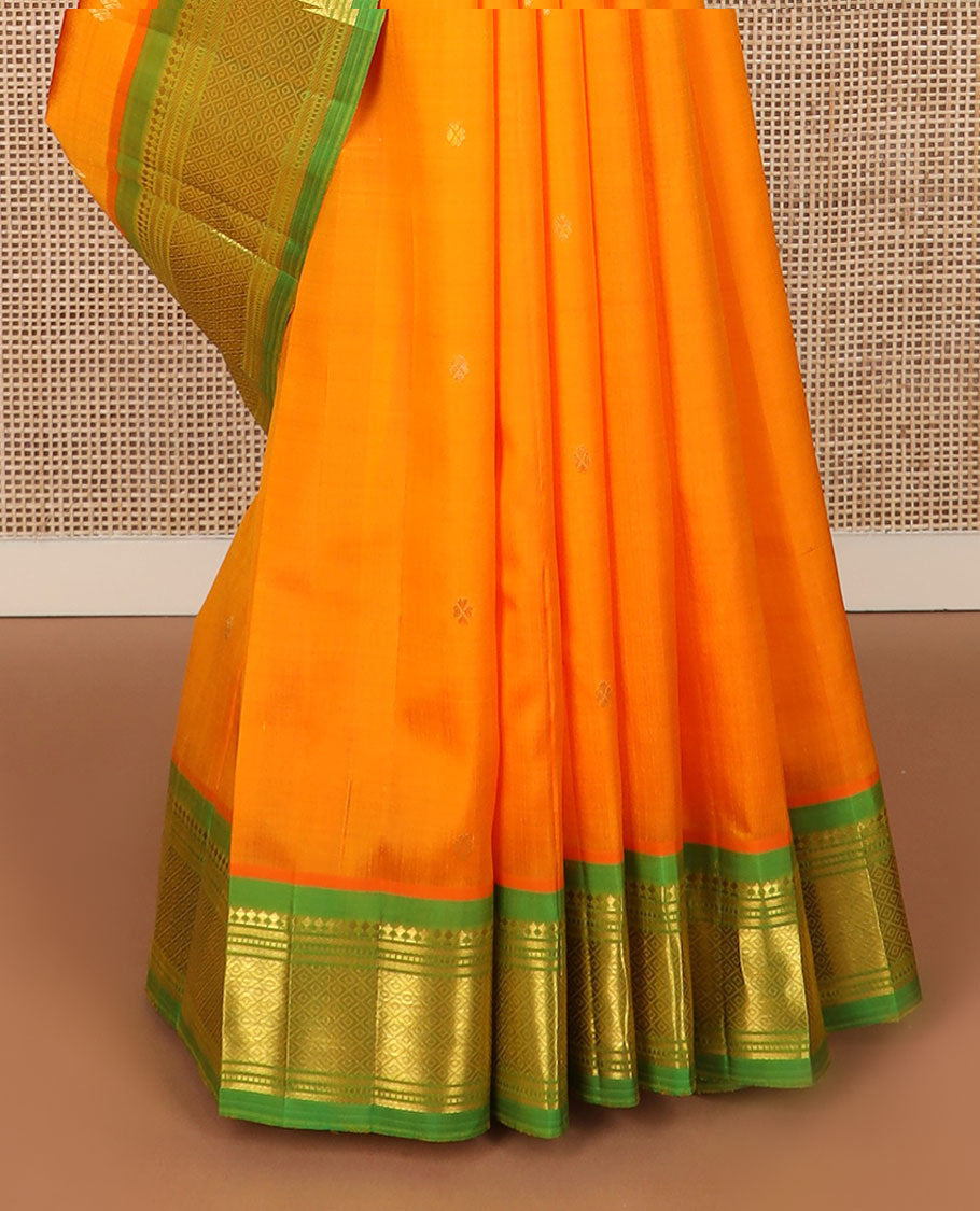 Orange zari buttas Kanchipuram silk saree, contrast border of panner sombu, banaras, muthu & mayil kann & zari design pallu