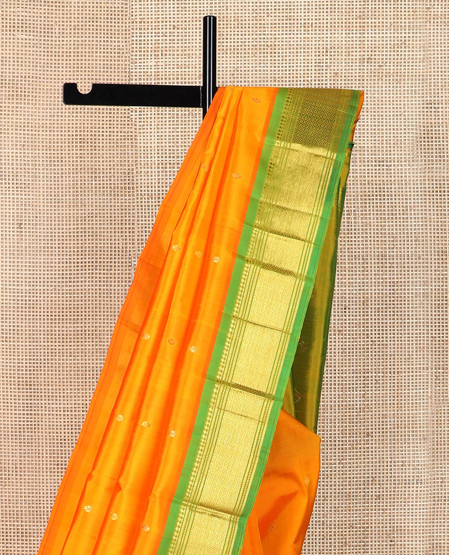 Orange zari buttas Kanchipuram silk saree, contrast border of panner sombu, banaras, muthu & mayil kann & zari design pallu