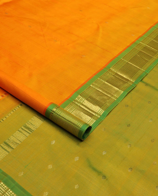 Orange zari buttas Kanchipuram silk saree, contrast border of panner sombu, banaras, muthu & mayil kann & zari design pallu