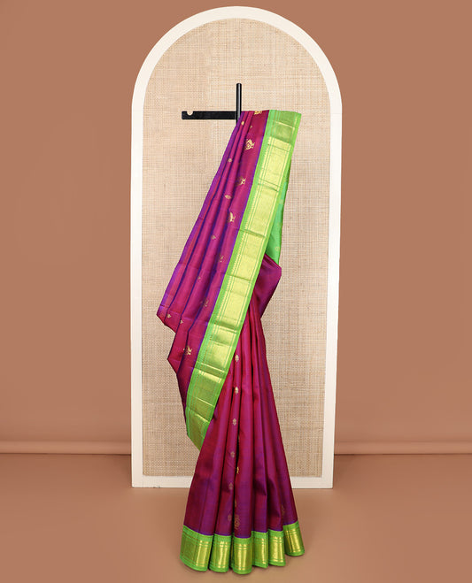 Purple zari buttas Kanchipuram silk saree, contrast one-sided korvai border of thilakam mokku, banaras, and jaal design, and zari design pallu