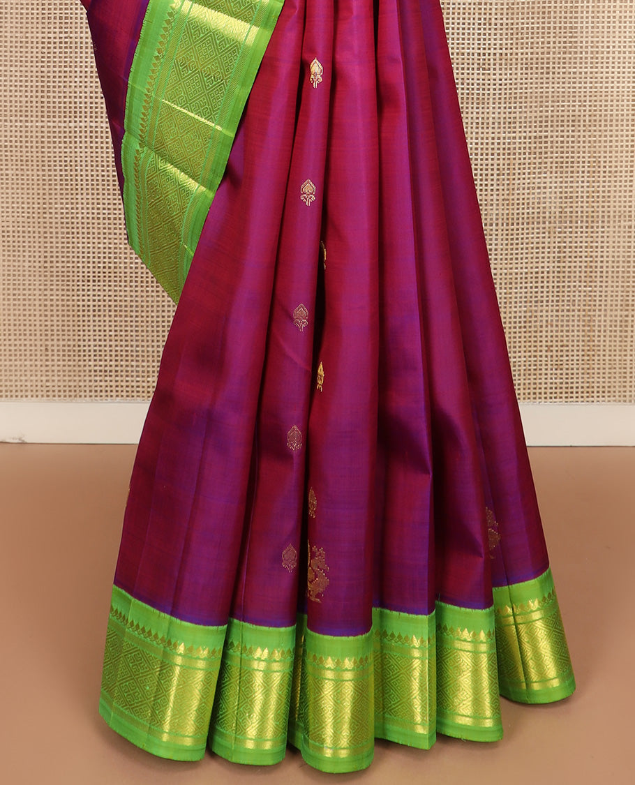 Purple zari buttas Kanchipuram silk saree, contrast one-sided korvai border of thilakam mokku, banaras, and jaal design, and zari design pallu