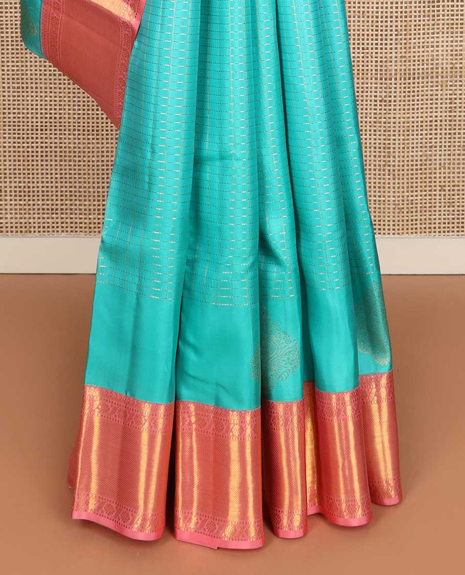 Blue zari buttas and checked Kanchipuram silk saree, contrast border of salngai, muthu, and cross kamalam designs, and jaal pallu