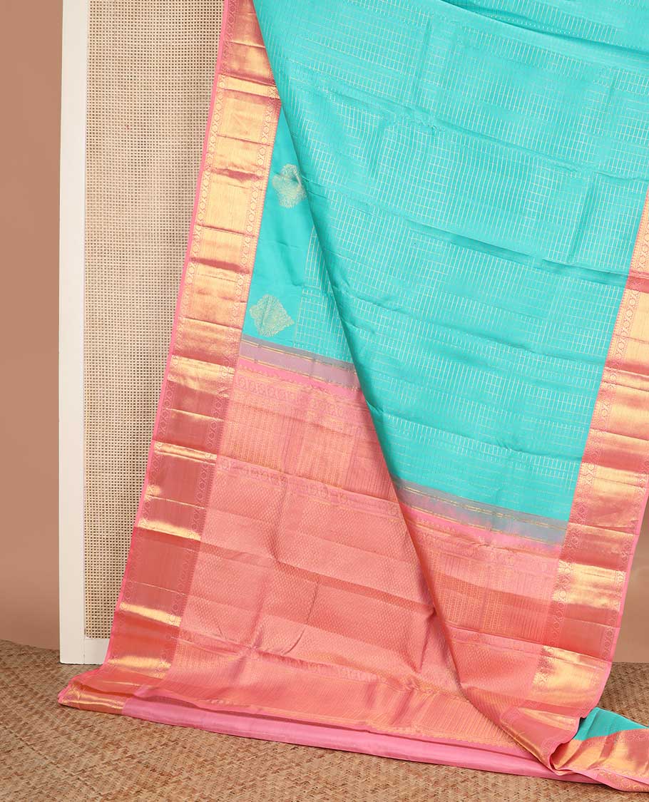 Blue zari buttas and checked Kanchipuram silk saree, contrast border of salngai, muthu, and cross kamalam designs, and jaal pallu