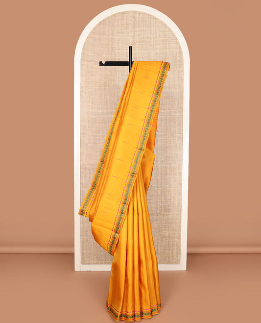 Yellow malli mokku buttas Kanchipuram silk saree, self-border of rekku, muthu, kathir, and rudraksham motifs, and  seppu rekku pallu