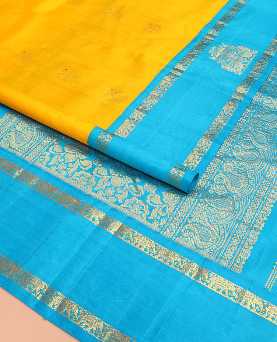 Yellow mayil buttas Kanchipuram silk saree, contrast border of yaanai, and mayil designs, and pallu of floral designs