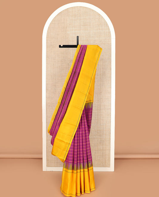 Purple checked Kanchipuram silk saree, contrast thazampoo rekku striped border, and striped pallu