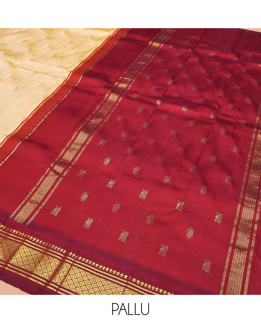 Sandal Kanchipuram Silk Saree Sparsely Sparkled with Zari Buttas, Complemented by Contrast One-Sided Thazampoo Rekku Border of Paneer Sombu, Banaras, and Mayil Kann Designs, Grandly Woven Pallu Steeped with Floral Designs, and Comes Without a Blouse