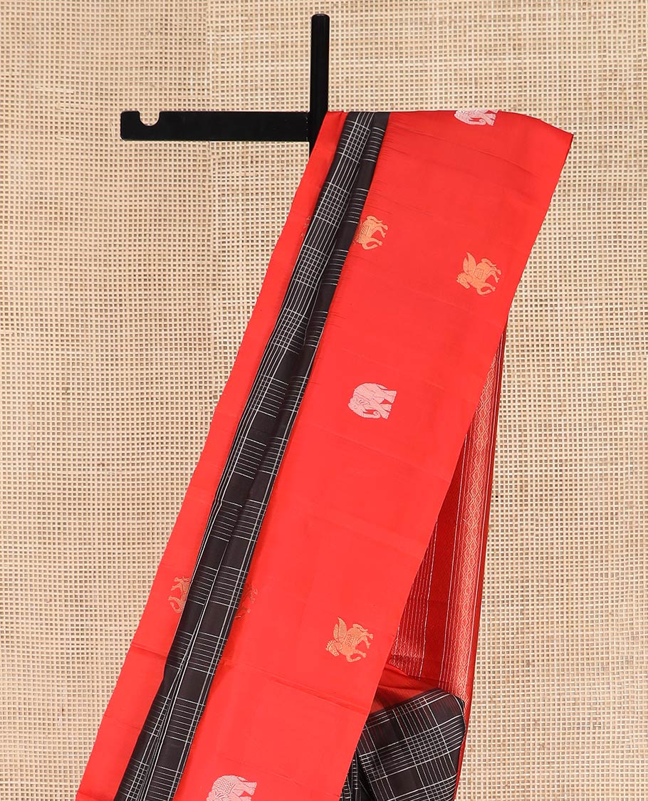 Brown Kanchipuram Silk Saree Decked Up with Checks All Over Its Body, Complemented by a Contrast Border of Kuthirai and Yaanai Designs, Gleaming Pallu of Jaal Designs, and Paired with a Contrast Blouse