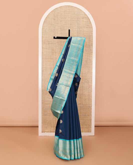 Blue zari buttas silk saree, contrast border of thilakam mokku,neli,mayil chakram,mayil kann & rudraksham & intricate pallu