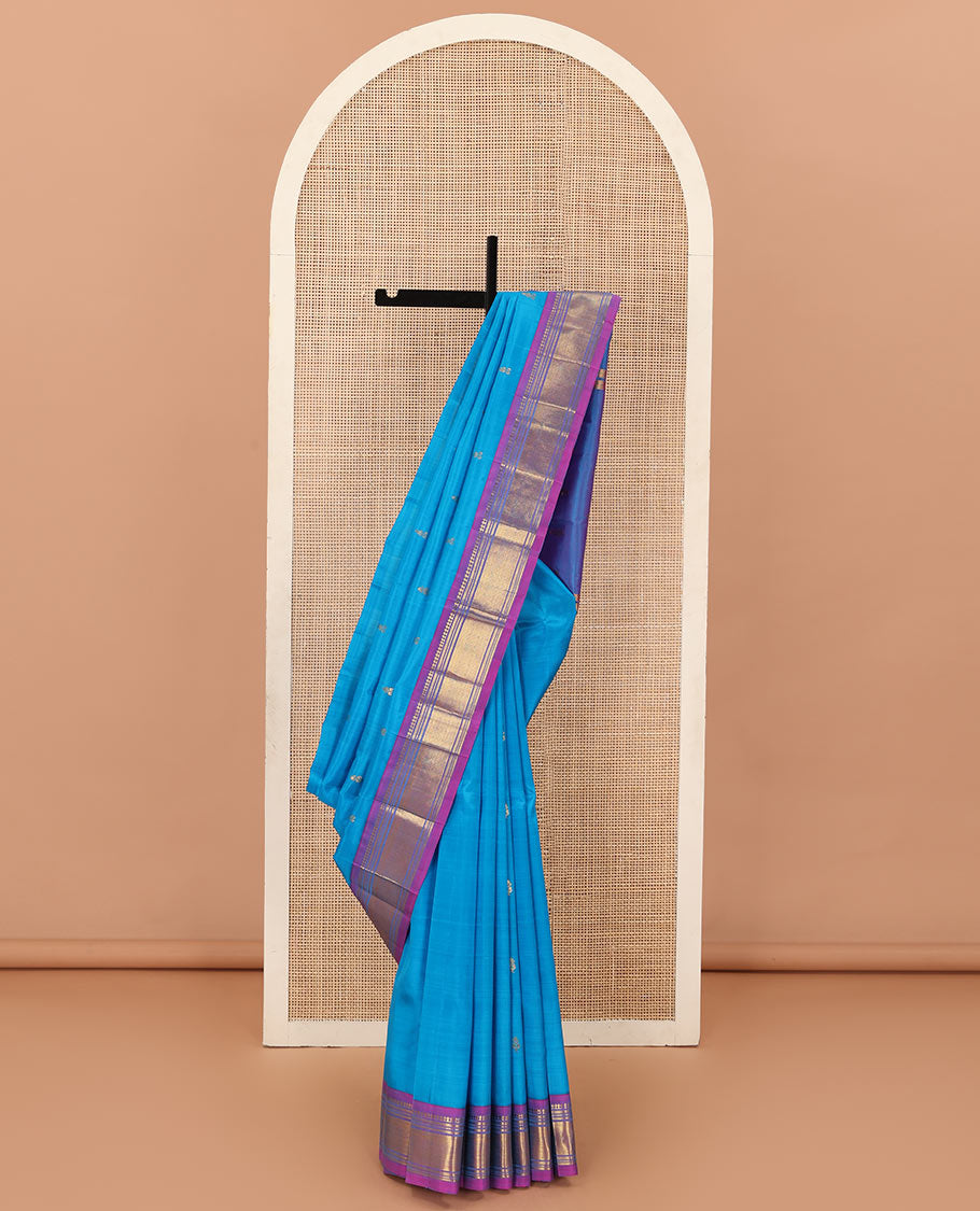 Aszure blue zari buttas Kanchipuram silk saree, contrast one-sided border of panner sombu, muthu, banaras, and jaal, and zari design pallu