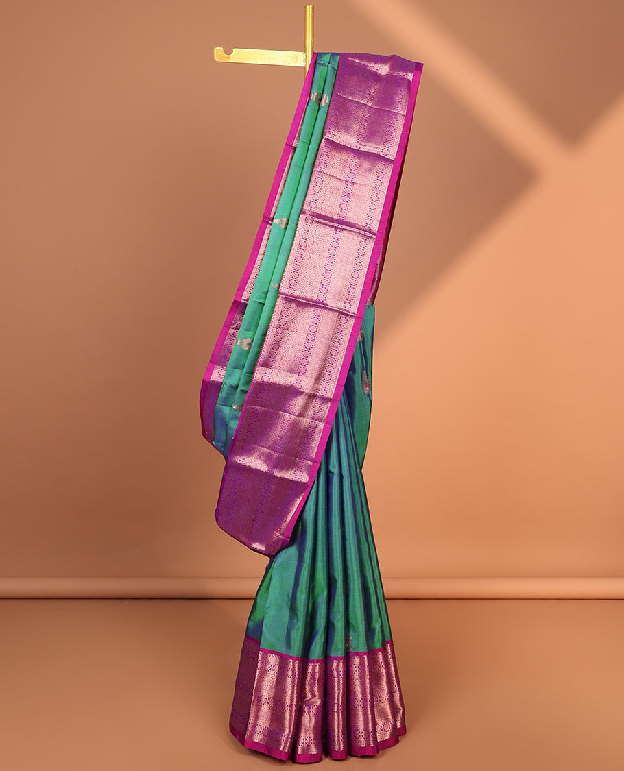 Green buttas kancheepuram silk saree with contrast intricate zari border & animal, floral enclosed checked design pallu