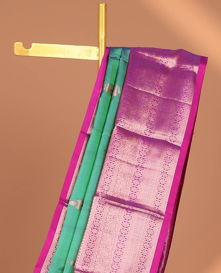 Green buttas kancheepuram silk saree with contrast intricate zari border & animal, floral enclosed checked design pallu