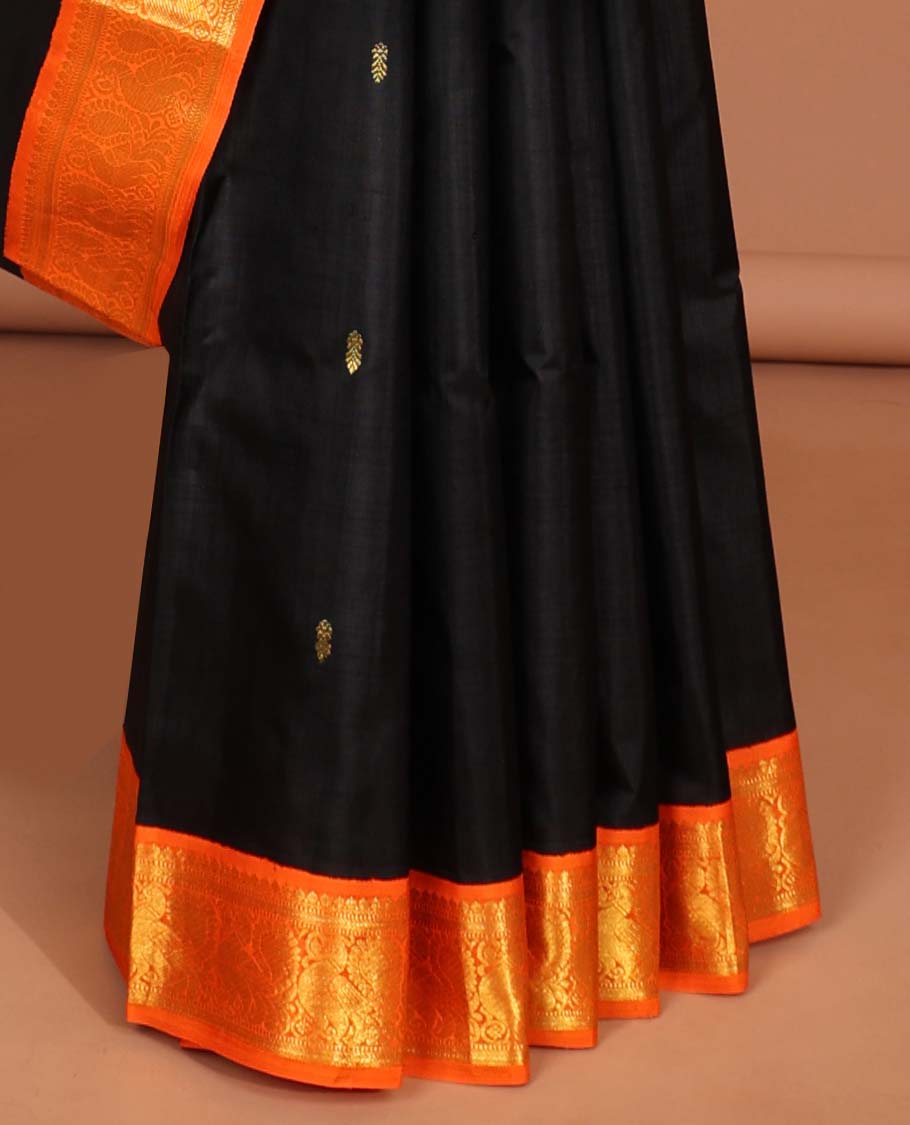Black floral buttas kancheepuram silk saree with intricate zari pallu & korvai border of thilakam mokku,banaras, mayil designs