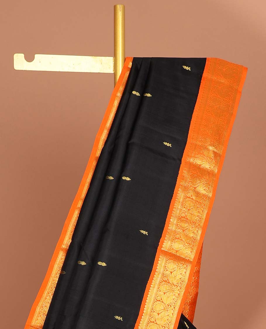 Black floral buttas kancheepuram silk saree with intricate zari pallu & korvai border of thilakam mokku,banaras, mayil designs
