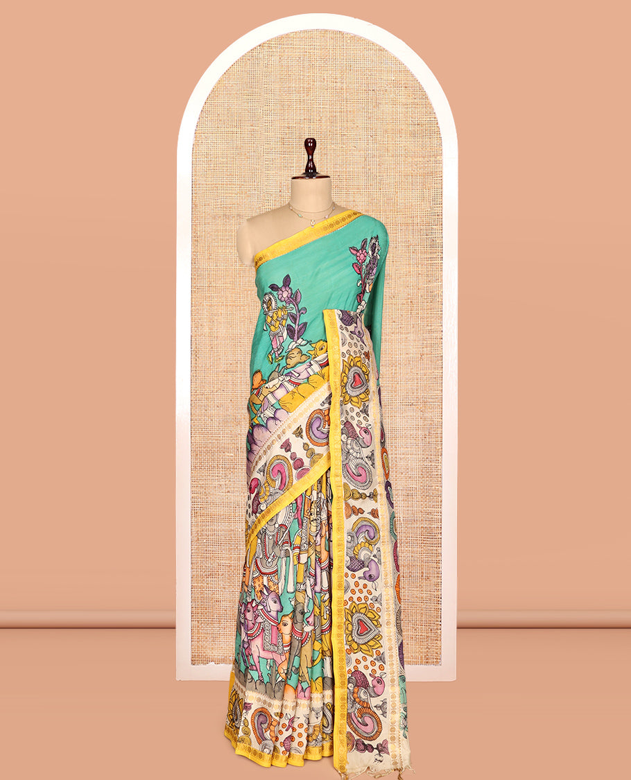 Turquoise Kalamkari Silk Saree, Enthralled with Human Figurines, a Contrast Peacock Border, Kalamkari Pallu, and a Contrast Blouse