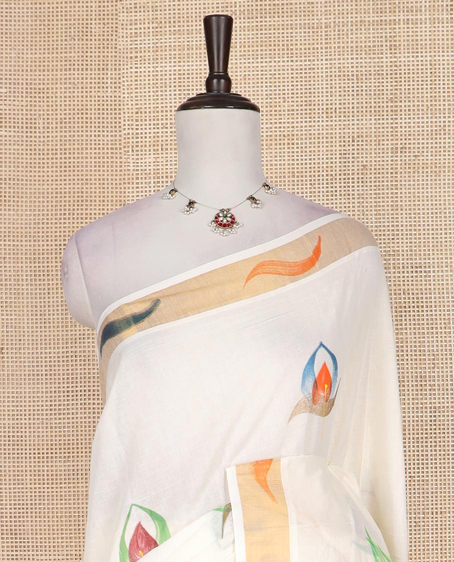Cream hand brush painting style floral motifs printed Kerala cotton saree, zari and dyed border, and hand brush painting pallu