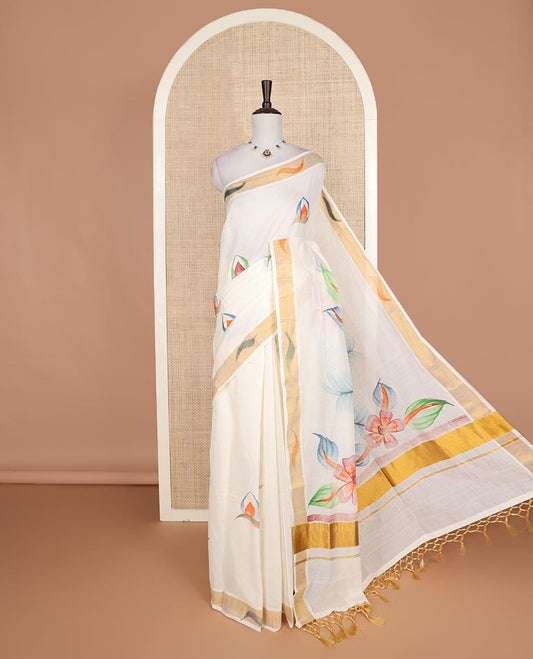 Cream hand brush painting style floral motifs printed Kerala cotton saree, zari and dyed border, and hand brush painting pallu