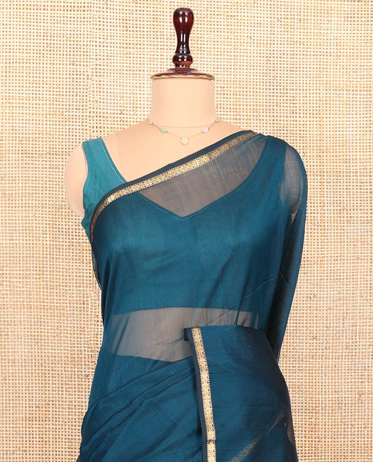 Peacock Blue Maheshwari Cotton Saree, Subtly Sparkled with Zari Buttas All Over Its Body, Highlighted by Zari Pipping Border, Scintillating Zari Decked Up Pallu and Paired with a Matching Blouse