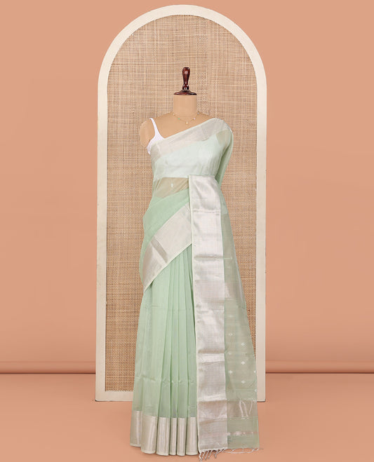 Green Maheshwari Cotton Saree, Sparsely Sparkled with Buttas All Over Its Body, Highlighted by Zari Border of Chevron Designs, Pallu Steeped with Buttas, and Paired with a Matching Blouse