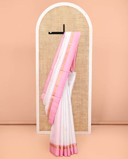 White Mayuri Soft Silk Saree, Simply Sparkled with Buttas All Over Its Body, Complemented by Contrast Kal Eragina Border of Vanki Designs, Sparsely Sparkled Pallu, and Paired with a Contrast Blouse