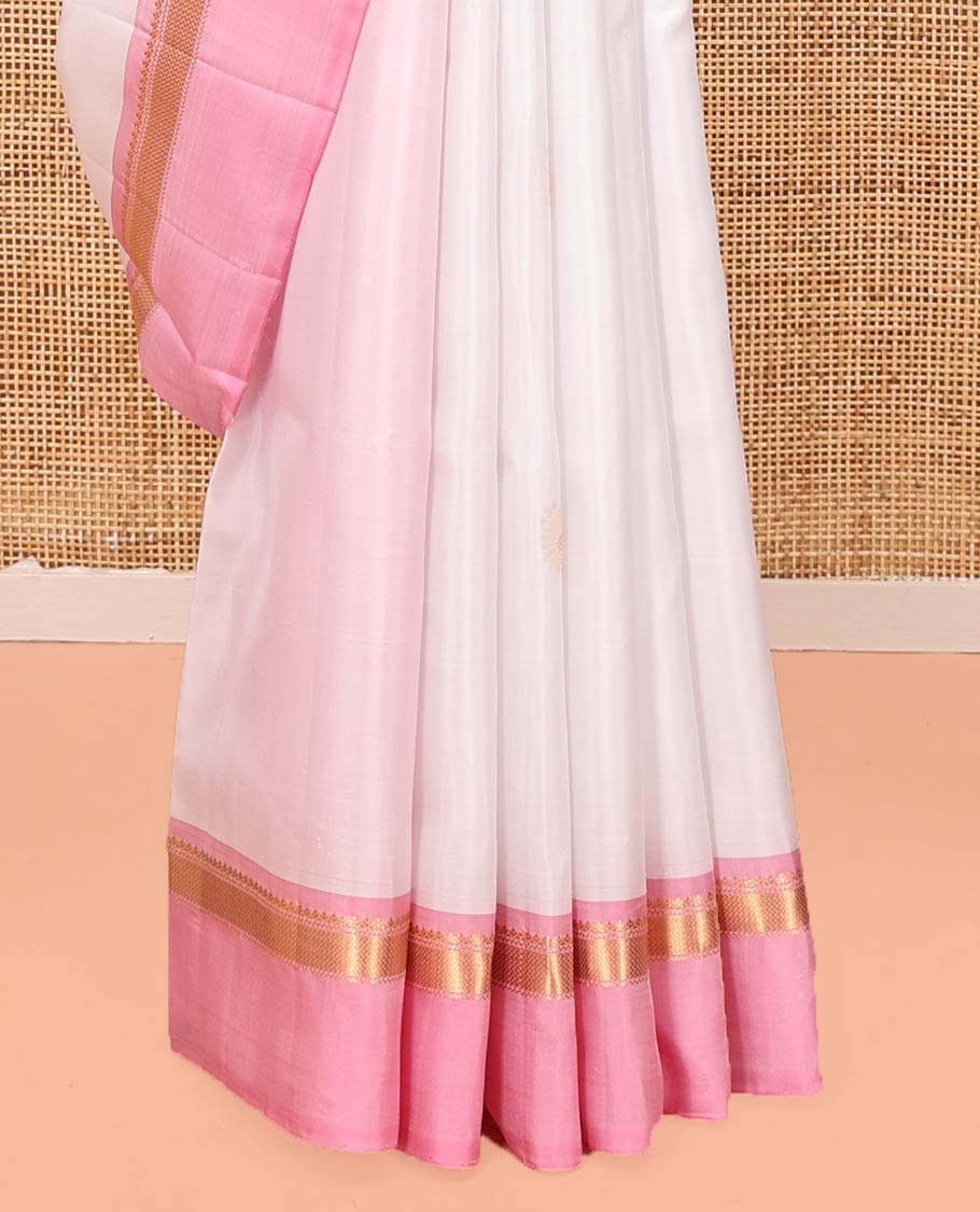 White Mayuri Soft Silk Saree, Simply Sparkled with Buttas All Over Its Body, Complemented by Contrast Kal Eragina Border of Vanki Designs, Sparsely Sparkled Pallu, and Paired with a Contrast Blouse