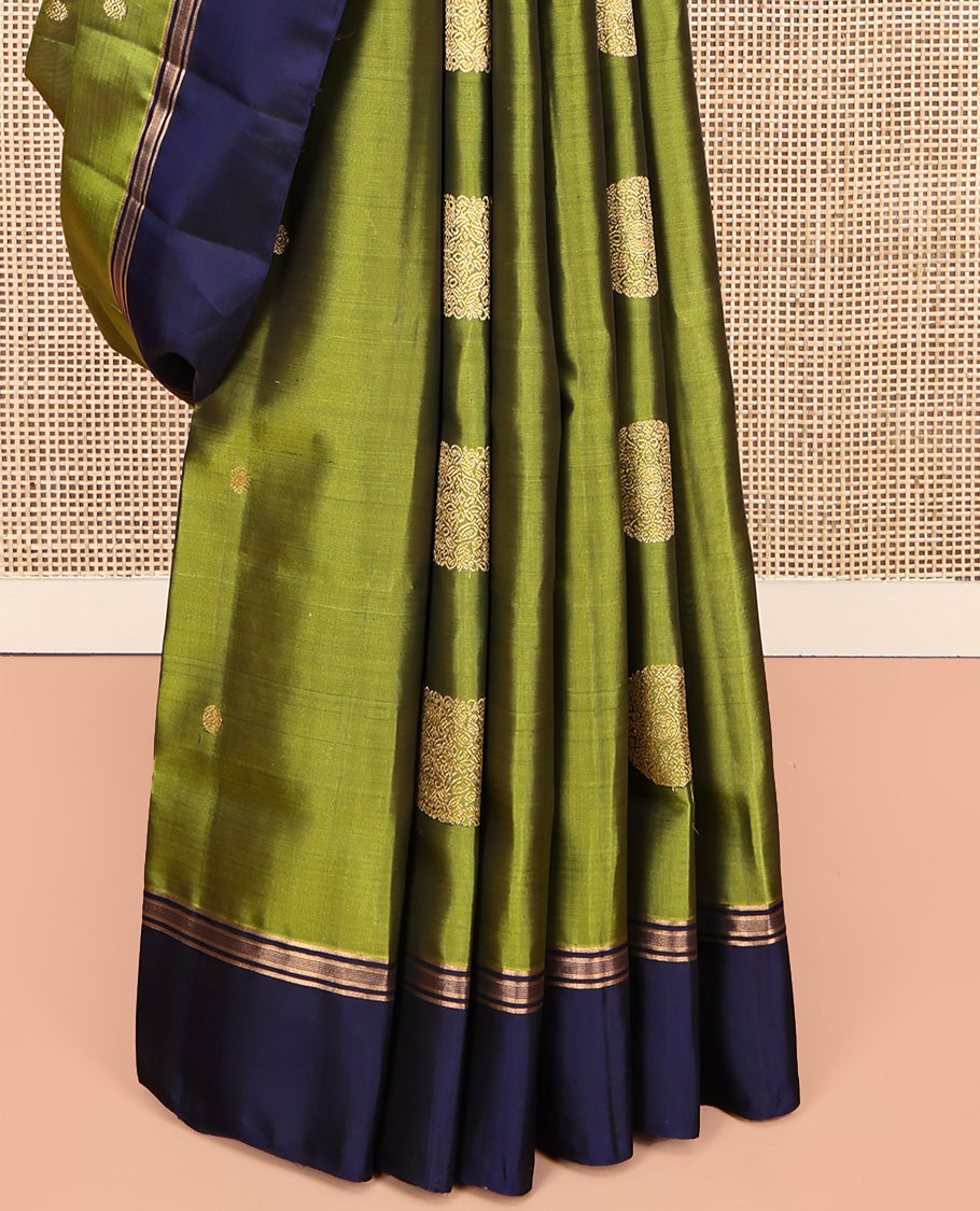 Green Mayuri Lite Silk Mix Saree, Gleamed Up with Square Buttas All Over Its Body, Complemented by Contrast  Border, Intricately Designed Pallu, and Paired with a Contrast Blouse