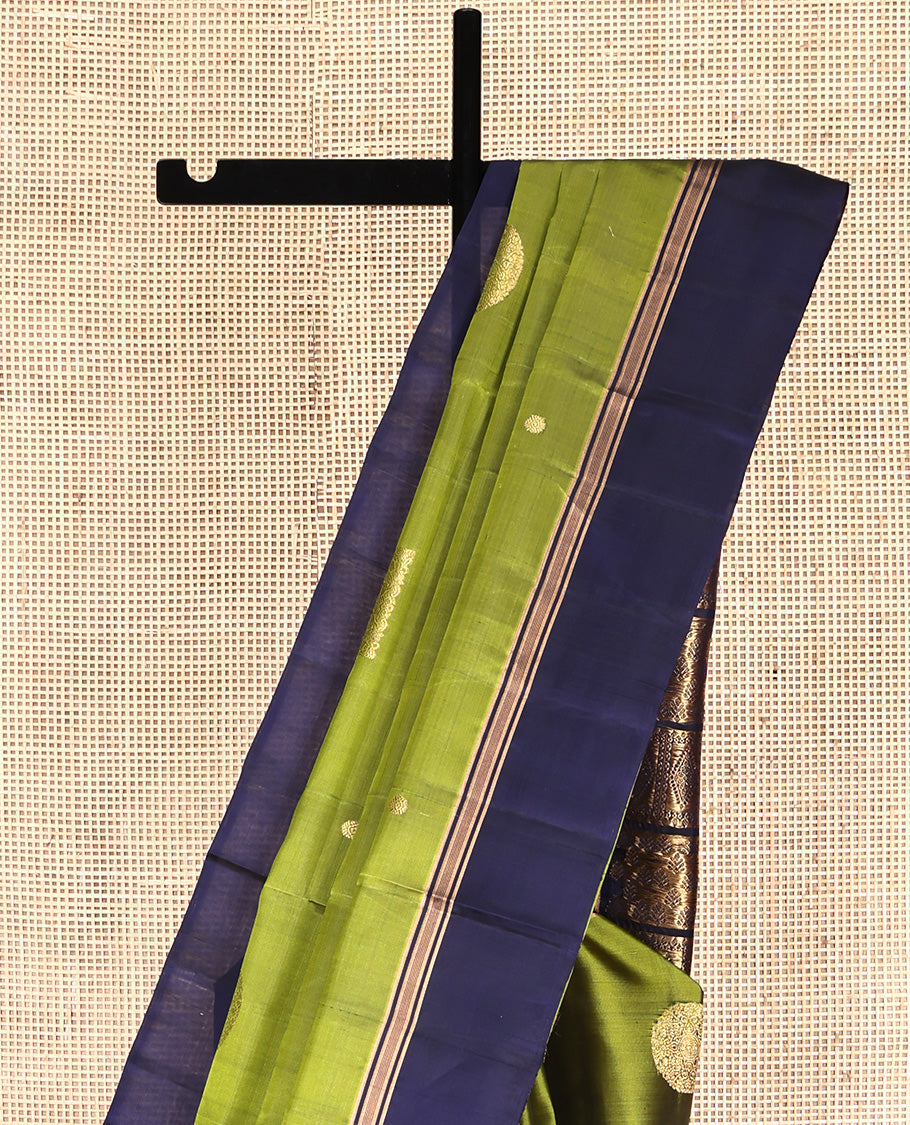 Green Mayuri Lite Silk Mix Saree, Gleamed Up with Square Buttas All Over Its Body, Complemented by Contrast  Border, Intricately Designed Pallu, and Paired with a Contrast Blouse