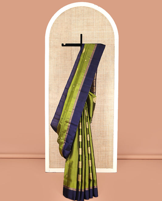Green Mayuri Lite Silk Mix Saree, Gleamed Up with Square Buttas All Over Its Body, Complemented by Contrast  Border, Intricately Designed Pallu, and Paired with a Contrast Blouse