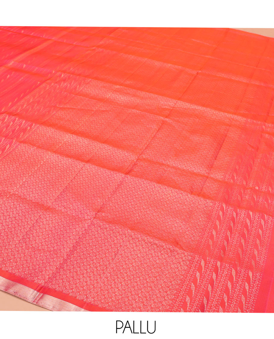 Orange Mayuri Soft Silk Saree, Mesmerized with Neli, and Muthu Designs All Over Its Body, Highlighted by Zari Border of Peacock Designs, Boldly Accentuated Jaal Pallu, and Paired with a Matching Blouse