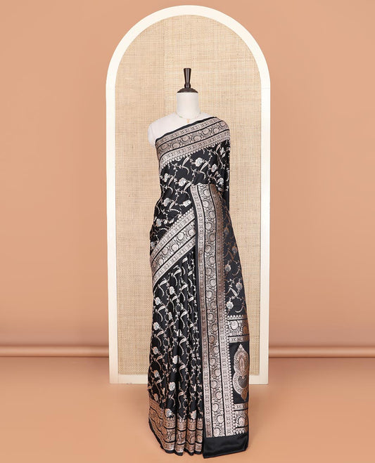 Black floral vine jacquard mushru silk saree, floral-paisley design zari border, and intricate pallu