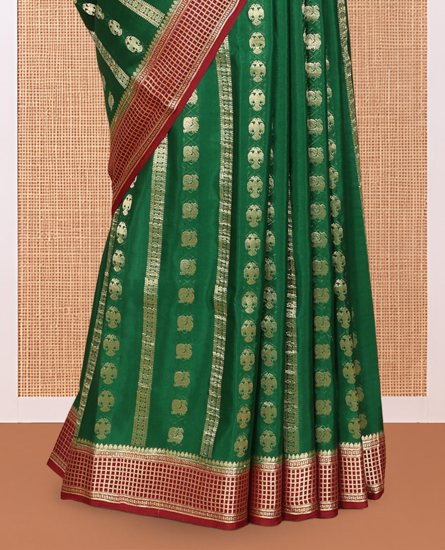 Green Mysore Silk Saree, Adorned with Peacock and Two-Headed Eagle Buttas, Complemented by a Contrast Traditional Zari Border, Intricate Pallu, and a Contrast Blouse