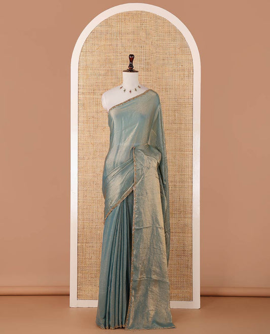 Sea green fendy chiffon saree with hand work border & self pallu along with hand work blouse