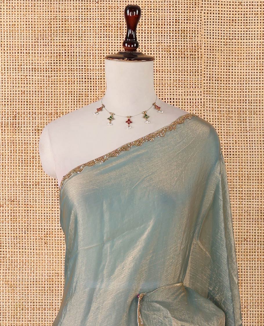 Sea green fendy chiffon saree with hand work border & self pallu along with hand work blouse