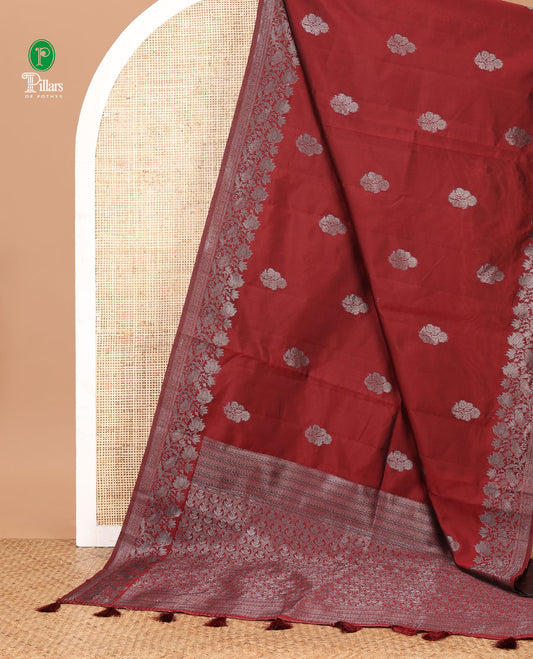 Maroon kanchi silk saree with flower zari buttas across its body, zari border of floral vine & ogee patterned pallu