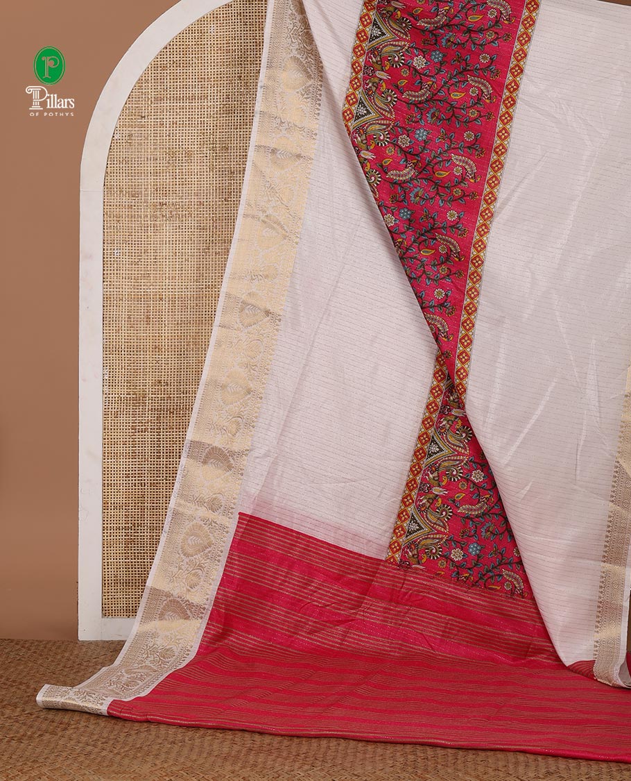 White and rani pink dola silk saree with zari stripes and kalamkari-theme motifs printed on its center of the body, golden zari jacquard border & zari design blouse